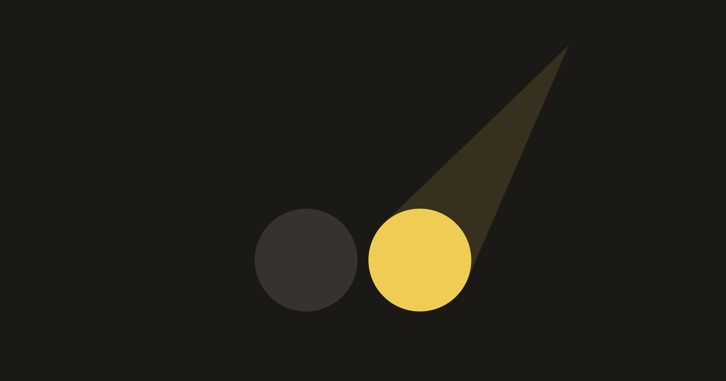 Two identical circles side by side in the dark. A beam of light falls on only one of them.